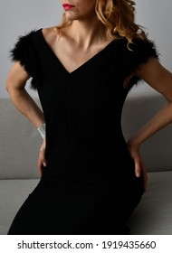 Elegant Women Wearing Beautiful Black Dress. No Face. 
