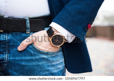 Elegant young business man's hand with fashion no brand wrist wa