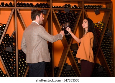 Elegant Young Couple Wine Tasting Sightseeing Tour Visiting Winery Cellar