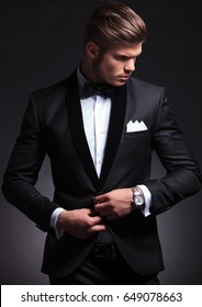 Elegant Young Fashion Man Buttoning His Stock Photo 649078663 ...