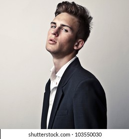 Elegant Young Handsome Man. Studio Fashion Portrait.