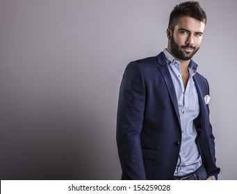 Elegant Young Handsome Man. Studio Fashion Portrait. 