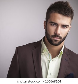 Elegant Young Handsome Man. Studio Fashion Portrait. 