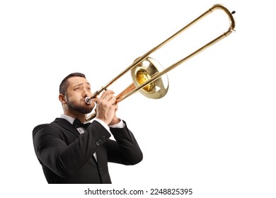 Elegant young man playing a trombone isolated on white background