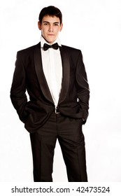 Elegant Young Man In Tuxedo, Studio On White