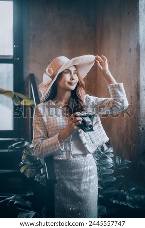 Similar – Long hair girl with hat and sunglasses walking in Sydney city streets in Australia.