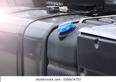 Element of an auto part of a large truck. Antifreeze tank.  