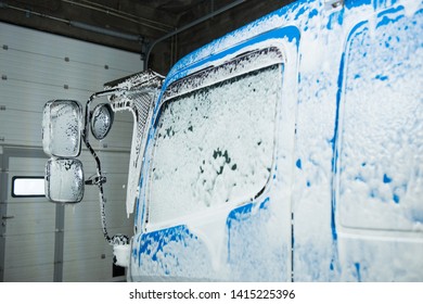 The Element Of The Cab Of The Blue Truck In The Lather During Washing.