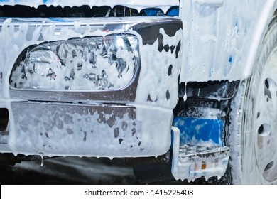 The Element Of The Cab Of The Blue Truck In The Lather During Washing.