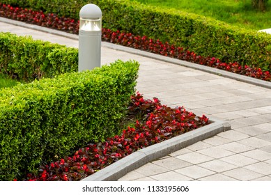 Element Flowerbed With A Street Lamp In Landscape Design