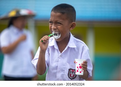 
Elementary School Children Are Directly Practicing How To Brush Their Teeth Properly Taught By A Health Nurse, North Kalimantan-Indonesia.January 16 2019