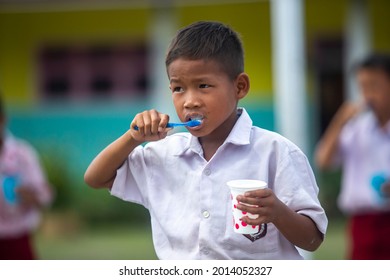 
Elementary School Children Are Directly Practicing How To Brush Their Teeth Properly Taught By A Health Nurse, North Kalimantan-Indonesia.January 16 2019