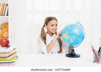 Elementary School Girl With Globe