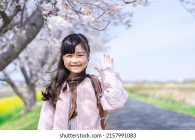 Elementary School Girl With Missing Baby Tooth