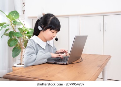 Elementary School Girl Taking Online Lessons