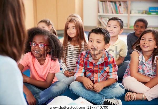 Elementary School Kids Sit On Floor Stock Photo (Edit Now) 1177740700