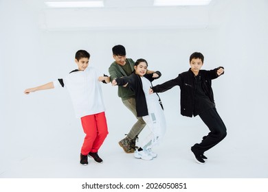 Elementary School Movement Dancer Lessons, Performance Dance Dance Classroom, Fun Group Workout Friendship In White Studio.