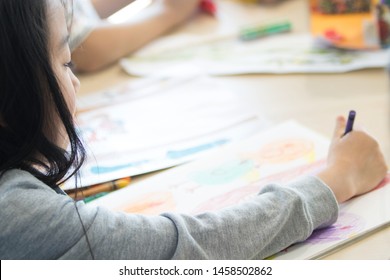 Elementary School Student Doing Drawing