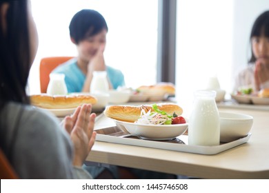 Elementary School Student Eating Lunch