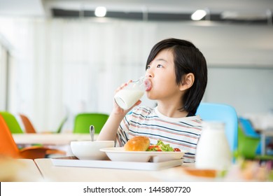 Elementary School Student Eating Lunch