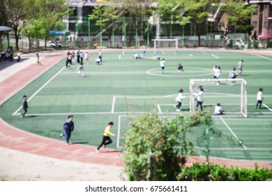 Elementary Students On School Playground In Physical Education Time In Korea - Blur Focus