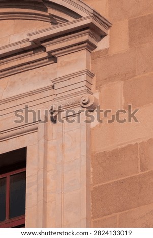 Elements of architectural decorations of buildings, columns, pommel and arches, plaster moldings, plaster patterns. On the streets in Spanish, public places. 
