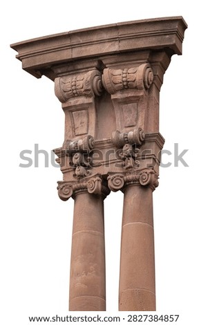 Elements of architectural decorations of buildings, columns, pommel and arches, plaster moldings, plaster patterns. On the streets in Barcelona, public places.