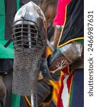 Elements of medieval iron knight armor for battle, helmet, spaulders, pouldrons