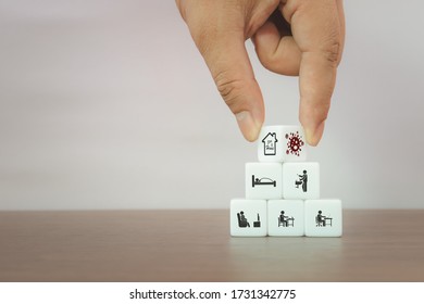 Elements of stay home to success against the corona virus concept, Hand holding white block with activity icon, Stay safe stay home. - Shutterstock ID 1731342775