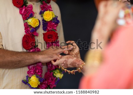 elements of Vedic wedding wearing rings