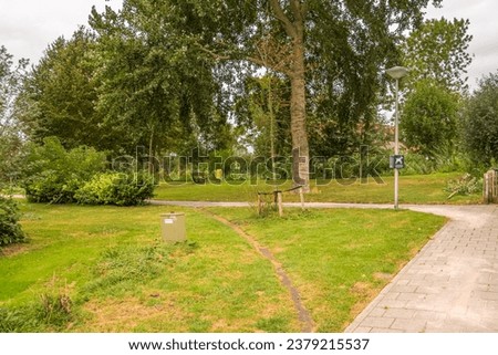 an elephant path in a park. A path created by walkers or cyclists.
