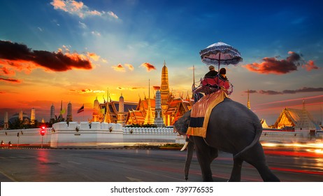 An Elephant with Tourists at Wat Phra Kaew -the Temple of Emerald Buddha- in the Grand Palace of Thailand in Bangkok - Shutterstock ID 739776535