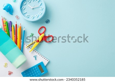 Elevate your educational materials with this top view photograph showcasing clock, notebook and stationery on pastel blue isolated background. Ideal for promotional purposes and text placement