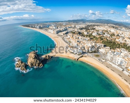 Elevate your project with our high-quality aerial footage capturing the essence of Blanes, a charming medieval town on the Costa Brava. Immerse yourself in the beauty of Spain's Mediterranean beaches 