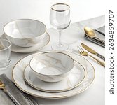 
Elevate your table setting with this exquisite Cello White  Dinner Set, featuring delicate gold rim accents and a unique flowing gold design, creating a refined and opulent aesthetic