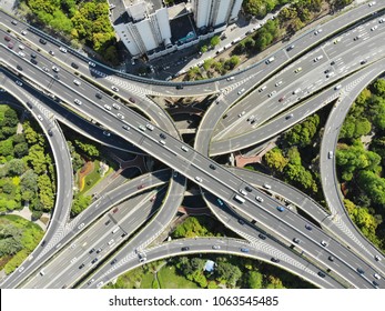 Elevated 5 Levels Road Junction Shanghai Center. Aerial Day View From Drone. Highway And Convergence Of Roads, Bridges, Viaducts In Shanghai Night, Transportation Infrastructure Development In China