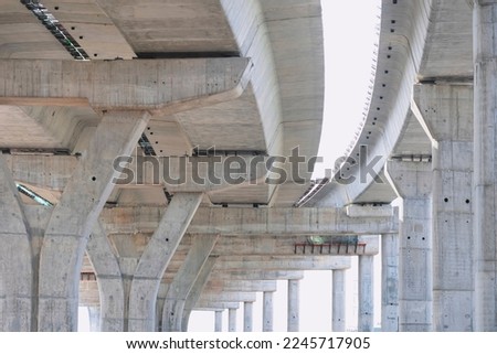 Elevated Expressway Foundation Structure in under Construction against white lacking sky background
