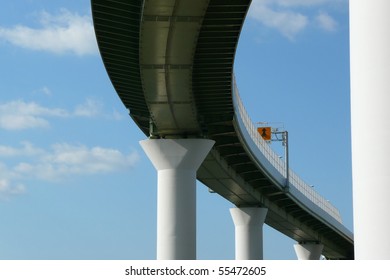 An elevated highway and a blue sky