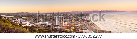 Elevated panoramic view of Muizenberg beach Cape Town at sunset 