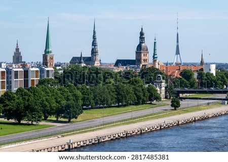 Elevated panoramic view of the Riga old town skyline with iconic church spires and TV tower