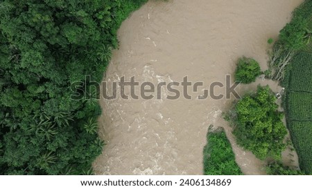 Elevated perspectives capture mesmerizing river currents from above.