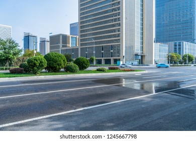 Elevated road front of modern buildings - Shutterstock ID 1245667798