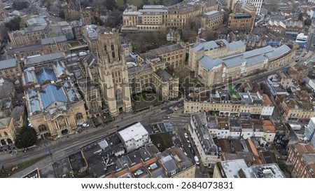 Elevated view of Bristol’s cityscape featuring the iconic Wills Memorial Building, surrounding university architecture, and a mix of historic and modern urban structures.