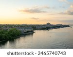 An elevated view of historic Old Town Alexandria Virginia and the Potomac River at sunset.
