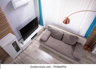 Elevated View Of Modern Living Room With Sofa And Television