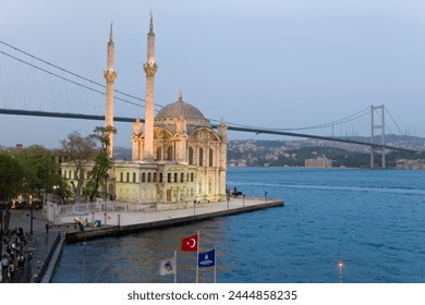 Elevated view over the Bosphorous Bridge and Ortakoy Camii Mosque (Buyuk Mecidiye Camii) in the trendy Ortakoy district, Istanbul, Turkey, Europe