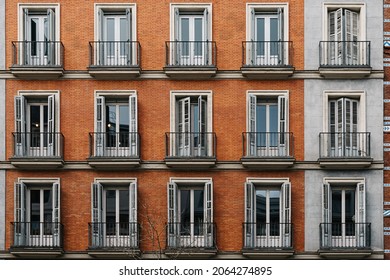 Elevation View of Old Luxury Residential Building with Brick Facade and Balconies. Salamanca District in Madrid. Real Estate market, property and maintenance concepts - Powered by Shutterstock