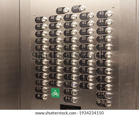 Elevator buttons in a 50-floor buiding
