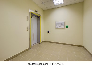 Elevator Hall With The Elevator Door Closed. On The Wall Hanging Plan Evacuation Scheme. Modern Elevator In A Commercial Building. Moscow 2019