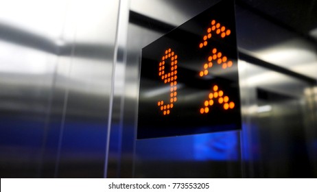 In elevator of modern business center on electronic LCD display. Interior of the elevator inside. View of the panel with the number and steel silver lining. monitor show number floor in elevator